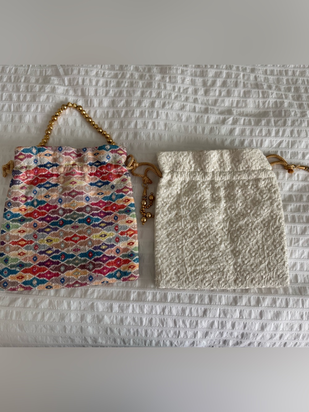 Multicolor and white Drawstring Bags